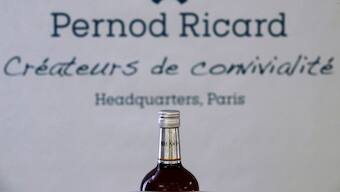 A logo is seen on a bottle of the Ricard aniseed-flavoured beverage displayed during French drinks maker Pernod Ricard news conference to announce the company annual results in Paris, France, August 29, 2018. File Image/Reuters