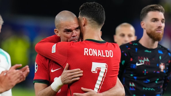 Watch: Cristiano Ronaldo comforts Pepe as Portugal's veterans exit at ...