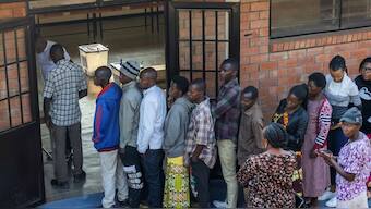 Voters queue before casting their ballots at a polling centre during the presidential election in Kigali, Rwanda July 15, 2024. Reuters