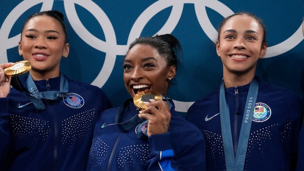  Biles back with a bang as USA win gymnastics gold; Seine remains a worry for organisers