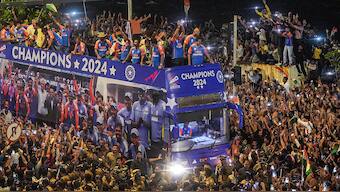 The T20 World Cup-winning Indian team was paraded through Mumbai's Marine Drive on an open-top bus on Thursday, 4 July. AP