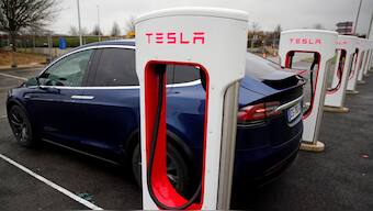 UBS analysts, including Joseph Spak, lowered their rating on Tesla's stock from neutral to sell, indicating that if the current market enthusiasm for AI wanes, Tesla's valuation could be negatively impacted. Image credit: Reuters