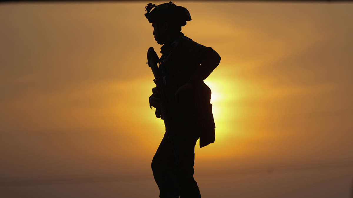 Thai soldier patrol the Moei river on the Thai side. AP Thai soldier patrol the Moei river on the Thai side. AP