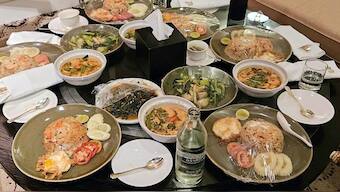 
Plates of food in the hotel room where six people were found dead at the Grand Hyatt Erawan in Bangkok, Thailand. Image Courtesy: Royal Thai police