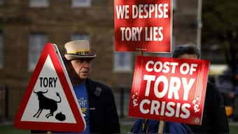 Demonstrators protest opposite UK parliament after Britain’s Prime Minister Liz Truss resigned in London, October 20, 2022. File Image/AP