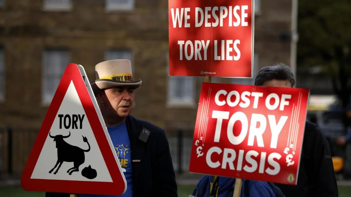 Demonstrators protest opposite UK parliament after Britain’s Prime Minister Liz Truss resigned in London, October 20, 2022. File Image/AP Demonstrators protest opposite UK parliament after Britain’s Prime Minister Liz Truss resigned in London, October 20, 2022. File Image/AP