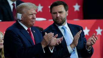 Republican presidential candidate and former US President Donald Trump and Republican vice presidential candidate Senator JD Vance applaud during the Republican National Convention on July 15 in Milwaukee. AP