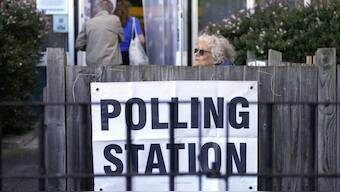 Voters arrive at a polling station in London, Thursday, July 4, 2024. Source: AP.