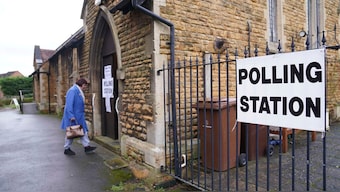 Voting in UK. AP