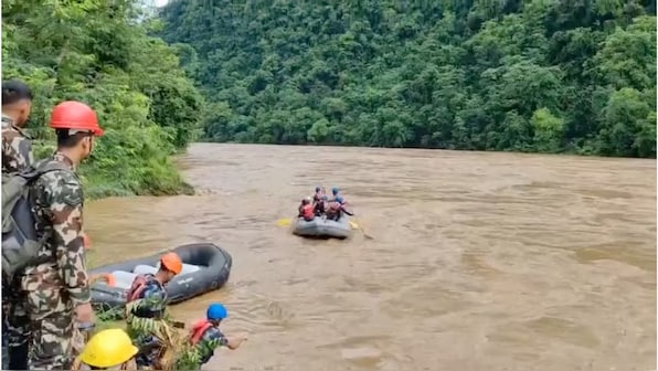 First body recovered, 50 missing after landslide sweeps buses into Nepal river