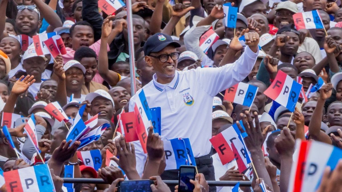 Rwanda president Paul Kagame with his supporters in a rally. Reuters Rwanda president Paul Kagame with his supporters in a rally. Reuters