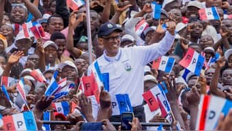 Rwanda president Paul Kagame with his supporters in a rally. Reuters