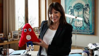 Mayor of Paris Anne Hidalgo poses with the official toy mascot, called the Phryges, of Paris 2024 Olympic and Paralympic Games during an interview with Reuters at Paris' cityhall, France, March 13, 2024. REUTERS