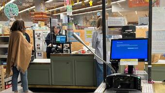 A cash register shows a blue screen at a grocery store affected by a cyber outage in Sydney, Australia July 19, 2024. Reuters