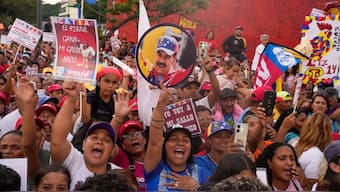Supporters of Venezuelan President Nicolas Maduro attend at a campaign rally in the Catia neighborhood of Caracas, Venezuela, July 18, 2024. File Photo/AP