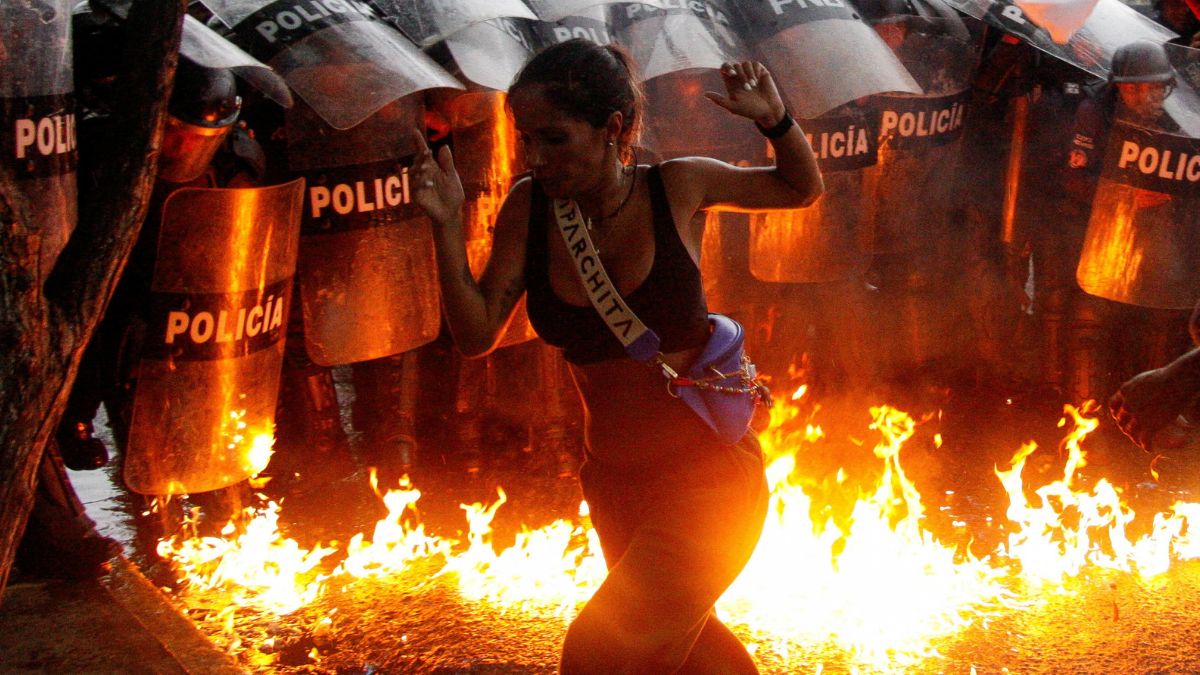 A demonstrator reacts when Molotov cocktails hit the ground in front of security forces during protests against election results after Venezuela's President Nicolas Maduro and his opposition rival Edmundo Gonzalez claimed victory in presidential election, in Puerto La Cruz, Venezuela. Reuters A demonstrator reacts when Molotov cocktails hit the ground in front of security forces during protests against election results after Venezuela's President Nicolas Maduro and his opposition rival Edmundo Gonzalez claimed victory in presidential election, in Puerto La Cruz, Venezuela. Reuters