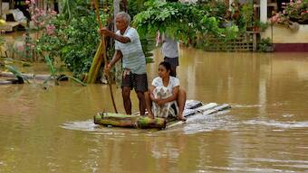 Flood-affected people use a makeshift raft to shift their lamb to a safer place following heavy rains at the Patiapam village in Nagaon district, in the northeastern state of Assam, July 3, 2024. Reuters
