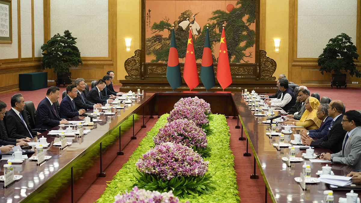 Chinese President Xi Jinping, second from left, and his delegation attend a meeting with Bangladesh Prime Minister Sheikh Hasina, fourth from right, at the Great Hall of the People in Beijing, China, on July 10, 2024. AP Chinese President Xi Jinping, second from left, and his delegation attend a meeting with Bangladesh Prime Minister Sheikh Hasina, fourth from right, at the Great Hall of the People in Beijing, China, on July 10, 2024. AP