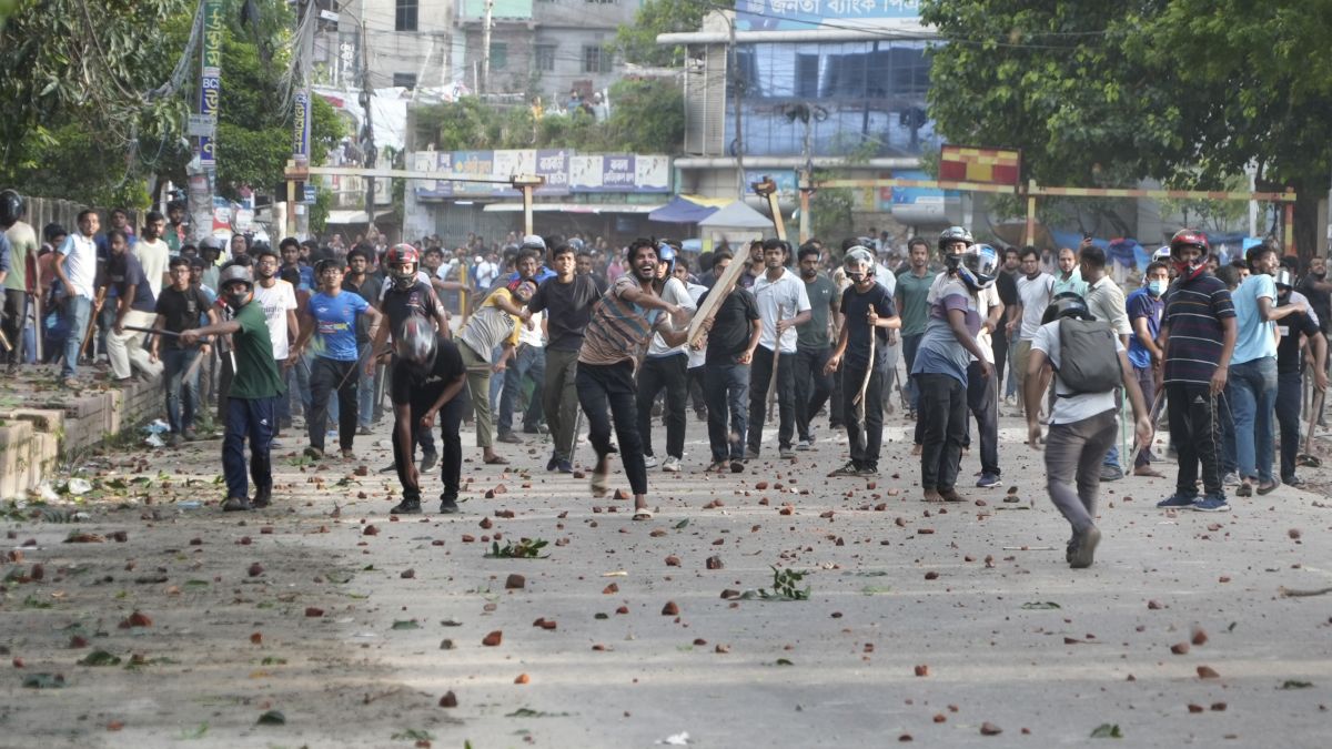 Students clash over a quota system at Jahangir Nagar University at Savar outside Dhaka, Bangladesh on 15 Julu. Police fired tear gas and charged demonstrators with batons overnight during violent clashes between a pro-government student body and student protesters. AP Students clash over a quota system at Jahangir Nagar University at Savar outside Dhaka, Bangladesh on 15 Julu. Police fired tear gas and charged demonstrators with batons overnight during violent clashes between a pro-government student body and student protesters. AP