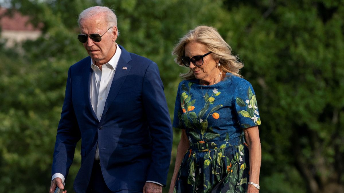 US President Joe Biden and first lady Jill Biden walk after stepping off Marine One following their arrival on the South Lawn of the White House in Washington, US, July 7, 2024. Reuters US President Joe Biden and first lady Jill Biden walk after stepping off Marine One following their arrival on the South Lawn of the White House in Washington, US, July 7, 2024. Reuters