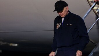 US President Joe Biden deboards Air Force One, at Dover Air Force Base in Dover, Delaware. He is currently self-isolating after contracting COVID. File Image / Reuters