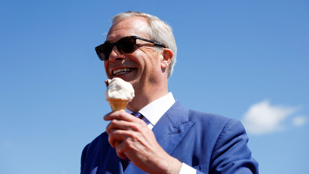 Britain's Reform UK Party Leader Nigel Farage eats an ice cream, on the day of the general election, in Clacton-on-Sea, Britain. Reuters Britain's Reform UK Party Leader Nigel Farage eats an ice cream, on the day of the general election, in Clacton-on-Sea, Britain. Reuters