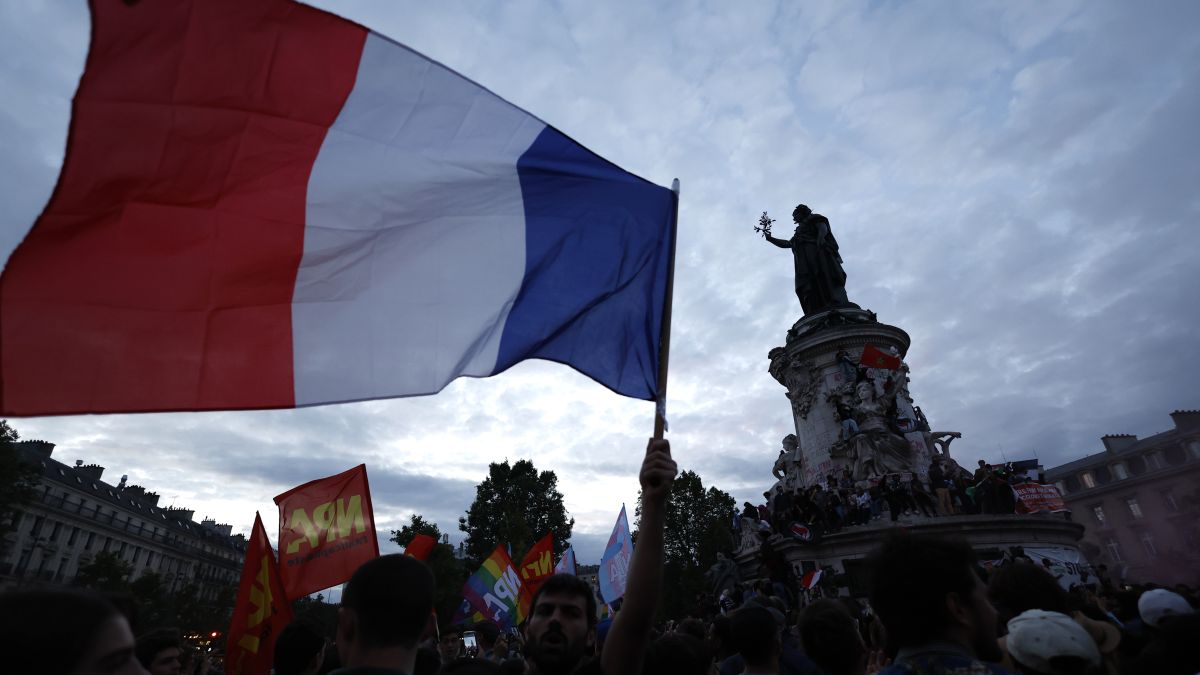People gather on the Republique plaza following the second round of the legislative elections, on July 7 in Paris. A coalition of the French left that quickly banded together to beat a surging far right in legislative elections won the most seats in parliament but not a majority, a stunning outcome that threatens to plunge the country into political and economic turmoil. AP People gather on the Republique plaza following the second round of the legislative elections, on July 7 in Paris. A coalition of the French left that quickly banded together to beat a surging far right in legislative elections won the most seats in parliament but not a majority, a stunning outcome that threatens to plunge the country into political and economic turmoil. AP