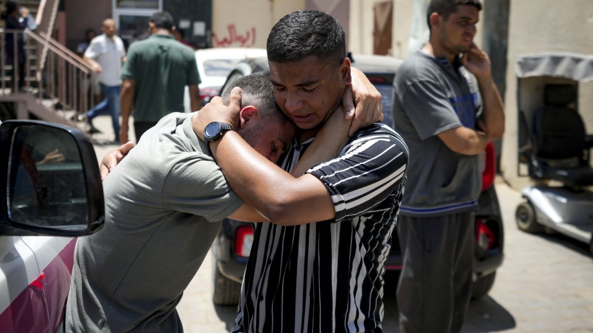 Palestinians mourn relatives killed in the Israeli bombardment of the Gaza Strip, at a hospital morgue in Deir al-Balah, on July 9. AP Palestinians mourn relatives killed in the Israeli bombardment of the Gaza Strip, at a hospital morgue in Deir al-Balah, on July 9. AP