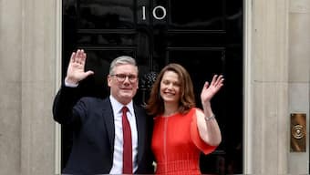 Incoming British Prime Minister Keir Starmer and his wife Victoria arrive at Number 10 Downing Street, following the results of the election, in London, UK, July 5, 2024. Reuters