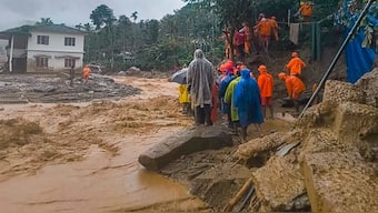 National Disaster Response Force (NDRF) personnel conduct rescue operations after huge landslides in the hilly areas near Meppadi, in Wayanad district, Kerala, in July 2024. PTI
