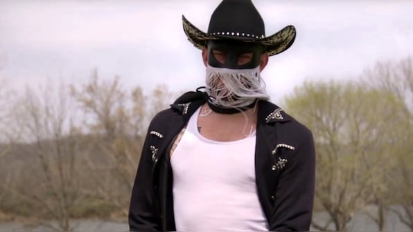 Orville Peck makes queer country for everyone. On ‘Stampede,’ stars like Willie Nelson join the fun