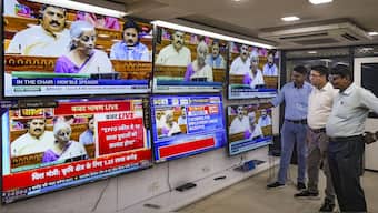 People watch the live telecast of Union Budget 2024-25, being presented in the Lok Sabha by Union Finance Minister Nirmala Sitharaman, at a television showroom, in Kolkata. PTI