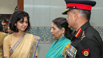 General Upendra Dwivedi interacts with Smriti Singh (left), wife of Capt Anshuman Singh who was awarded Kirti Chakra (posthumous) during the Defence Investiture Ceremony-2024, in New Delhi, on July 6. PTI