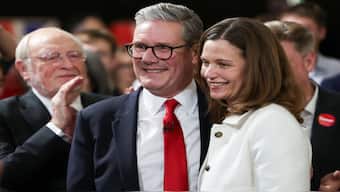 Britain's Labour Party leader Keir Starmer celebrates with his wife Victoria after the party secured a massive win in the elections. A busy 24 hours now await Starmer. Reuters