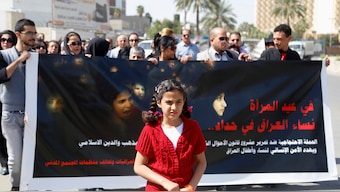 Protesters take part in a demonstration against the draft of the "Al-Jafaari" Personal Status Law during International Women's Day in Baghdad. Reuters