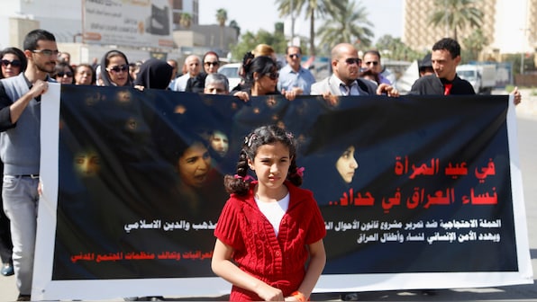 What is Iraq's proposed law that may allow girls to marry at 9?