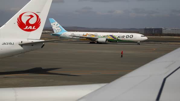 How a pair of scissors led to more than 30 flight cancellations at Japan's airport
