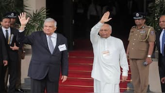 President Ranil Wickremesinghe and Prime Minister Dinesh Gunawardena gesture as they arrive at the Election Commission in Rajagiriya to submit his nomination papers for the upcoming presidential election, scheduled for September 21, in Colombo, Sri Lanka. Reuters