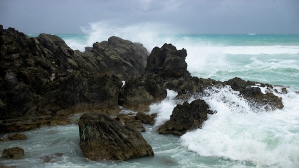 Storm surge warning issued for Bermuda as Hurricane Ernesto weakens