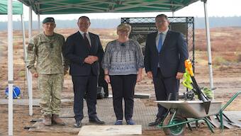 Commander of Lithuanian Army Raimundas Vaiksnoras, German Secretary of State for Defence Nils Hilmer, Lithuanian Prime Minister Ingrida Simonyte and Lithuanian Defence Minister Laurynas Kasciunas pose for a photo in Rudninkai, Lithuania. Reuters