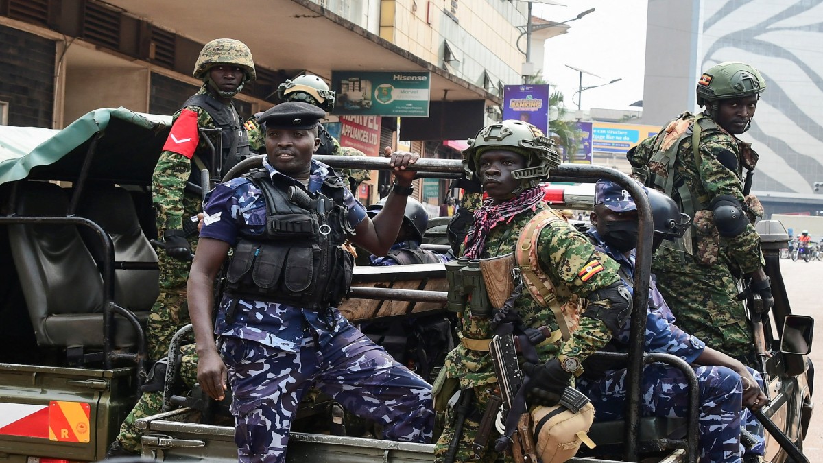 Police officers react as Ugandan activists participate in a demonstration over proposed plans by Total Energies and the Ugandan government to build the East African Crude Oil Pipeline (EACOP) in Kampala, Uganda. Reuters Police officers react as Ugandan activists participate in a demonstration over proposed plans by Total Energies and the Ugandan government to build the East African Crude Oil Pipeline (EACOP) in Kampala, Uganda. Reuters