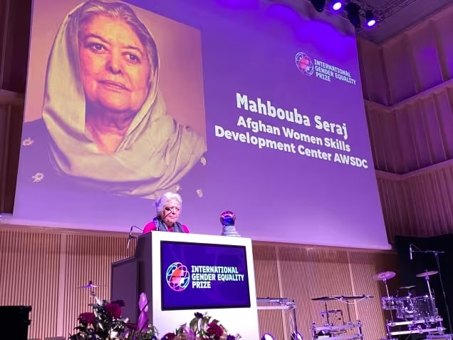 Afghan journalist and women&#39;s right activist Mahbouba Seraj collected the award on behalf of AWSDC. X