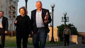 Glenn Walz and Tim Walz. AFP