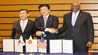 South Korean Defence Minister Shin Won-sik (left to right), Japanese Defence Minister Minoru Kihara, and US Defence Secretary Lloyd Austin pose for a photo in a trilateral ministerial meeting on July 28, 2024. AFP 