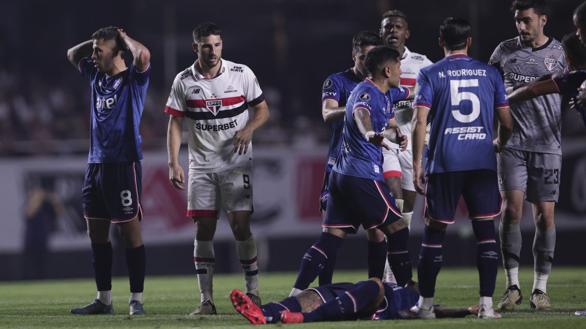 Juan Izquierdo of Uruguay's Nacional, collapsed on the pitch during a Copa Libertadores game against Brazil's Sao Paulo Thursday. AP Juan Izquierdo of Uruguay's Nacional, collapsed on the pitch during a Copa Libertadores game against Brazil's Sao Paulo Thursday. AP