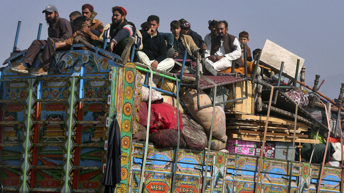 (File) Afghan families onboard a truck head toward a border crossing point in Torkham, Pakistan on October 31, 2023. AP (File) Afghan families onboard a truck head toward a border crossing point in Torkham, Pakistan on October 31, 2023. AP