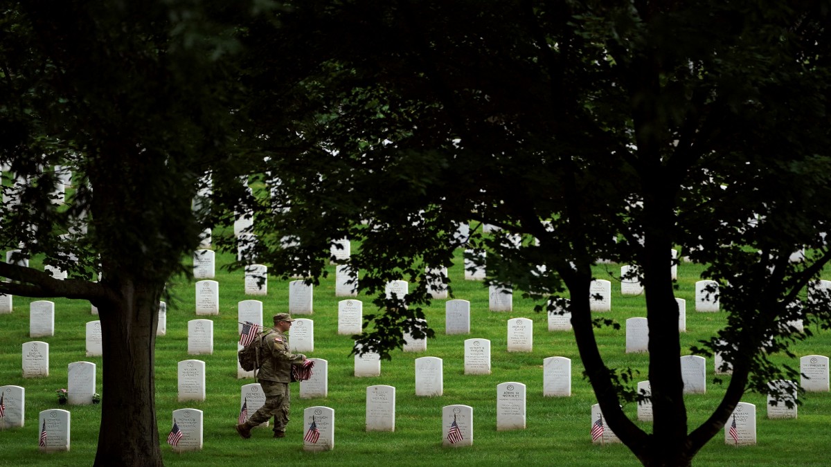 Trump campaign staffers engage in altercation with Arlington National Cemetery official Trump campaign staffers engage in altercation with Arlington National Cemetery official