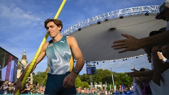 Armand Duplantis competes during the men's pole vault competition at the World Athletics Diamond League meet in Lausanne, Switzerland. Keystone via AP