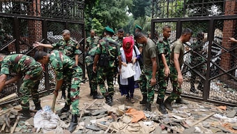 Members of the army clear an entrance of the Ganabhaban, the Bangladeshi prime minister's residence, a day after the resignation of Prime Minister Sheikh Hasina, in Dhaka on August 6, 2024. Reuters