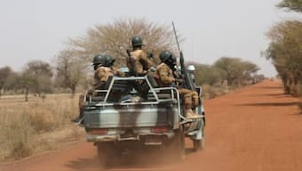 Soldiers from Burkina Faso patrol on the road of Gorgadji in sahel area, Burkina Faso. Source: REUTERS/FILE